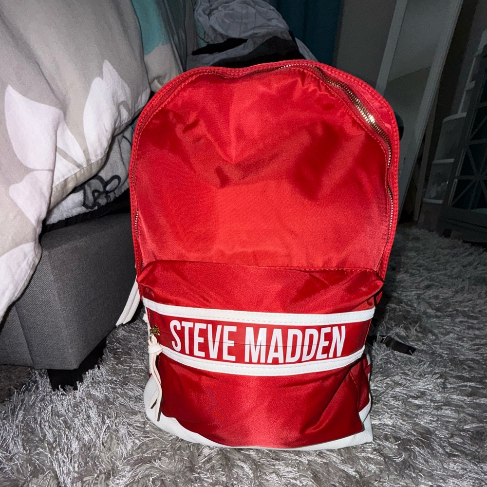 Steve Madden Bold Red Backpack with white lettering and leather straps